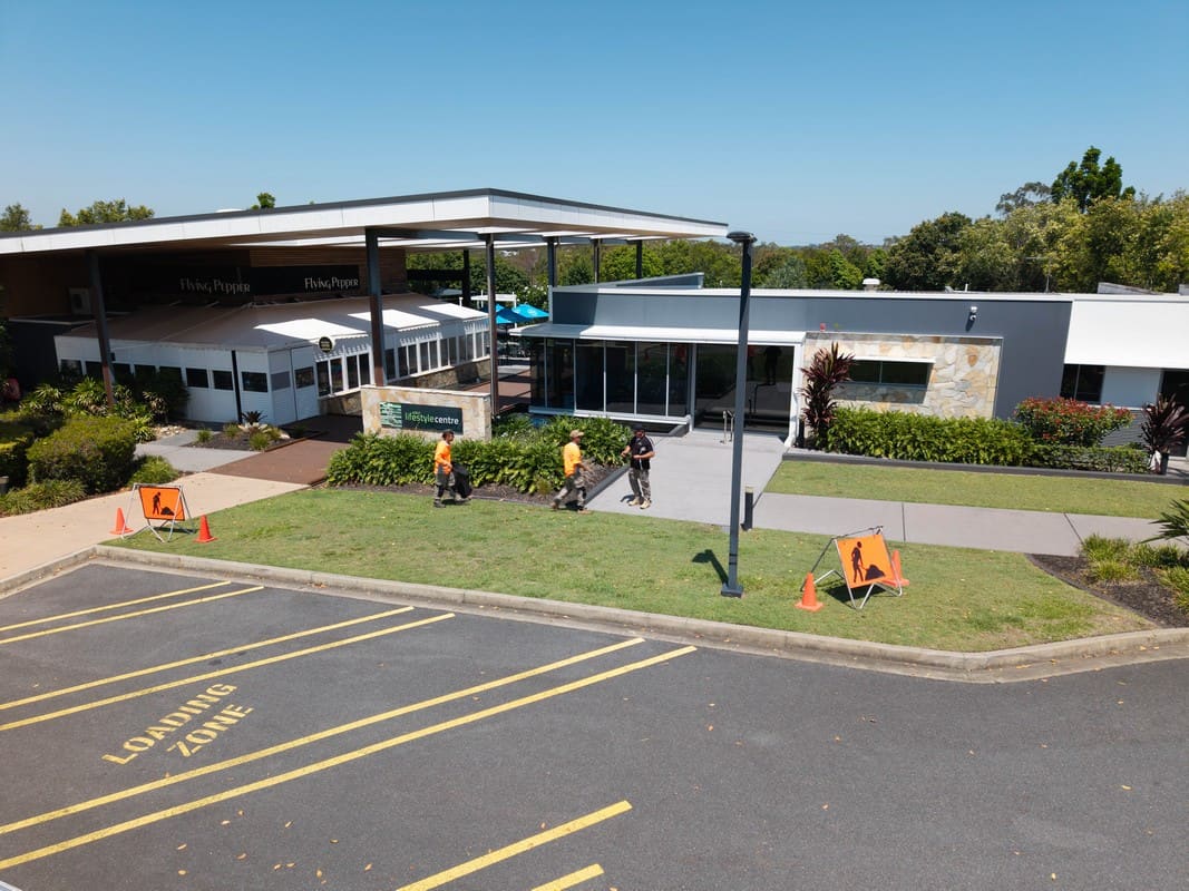 Element Queensland commercial landscape maintenance crew Element Queensland crew performing commercial landscape maintenance from aerial view