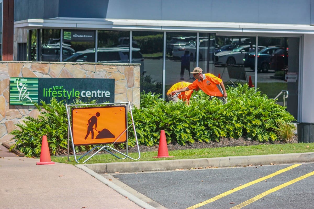 Element crew trimming hedges at lifestyle centre