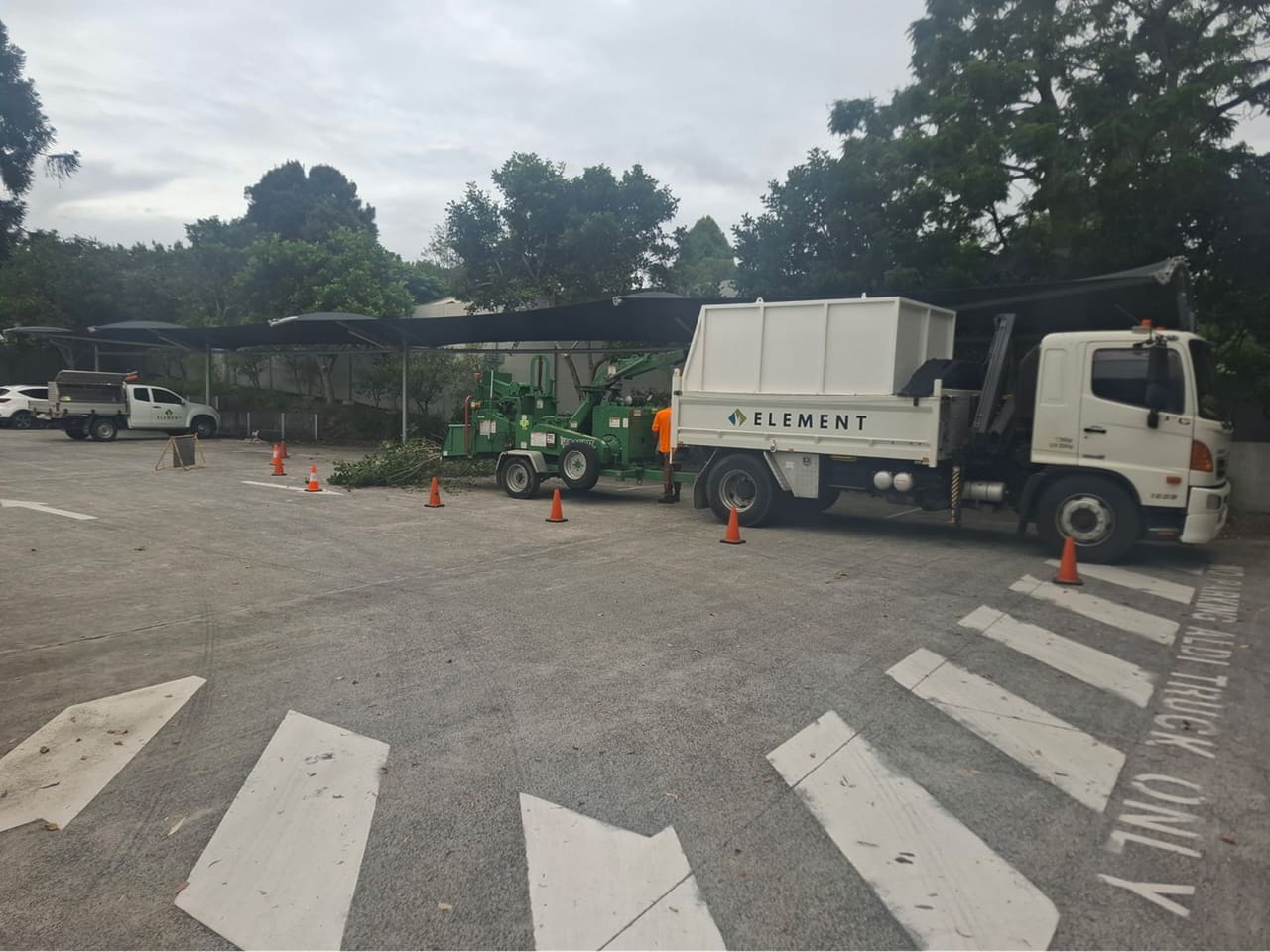 Element Queensland chipper truck and wood chipper on site for arboricultural services