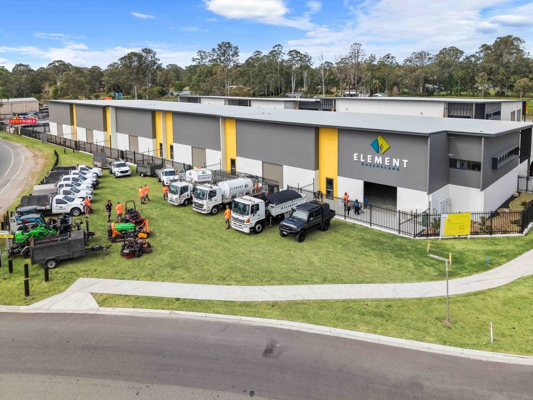 Element Queensland team and fleet Element Queensland full team with branded fleet vehicles at headquarters
