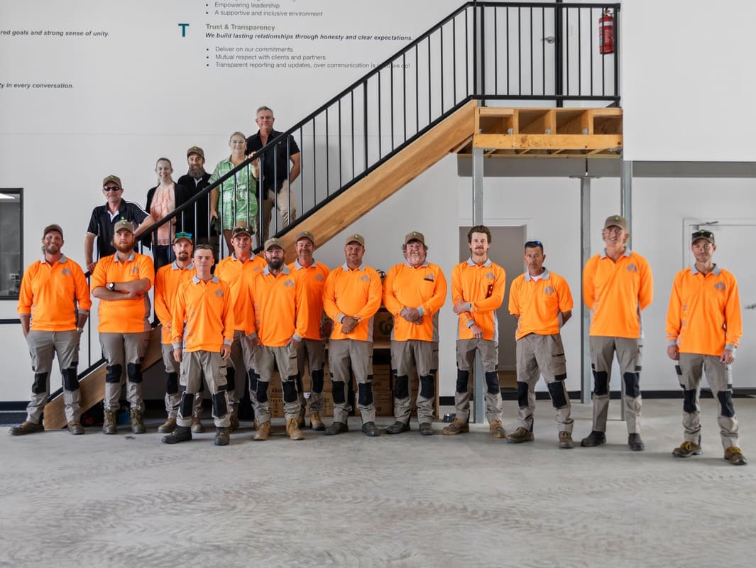 Element Queensland full team group photo on warehouse stairs