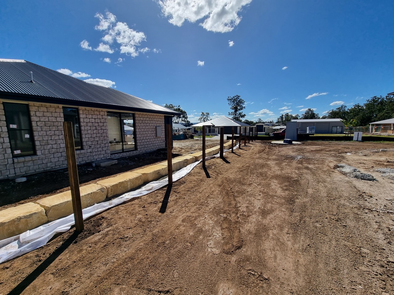 Boundary retaining wall and fencing progress
