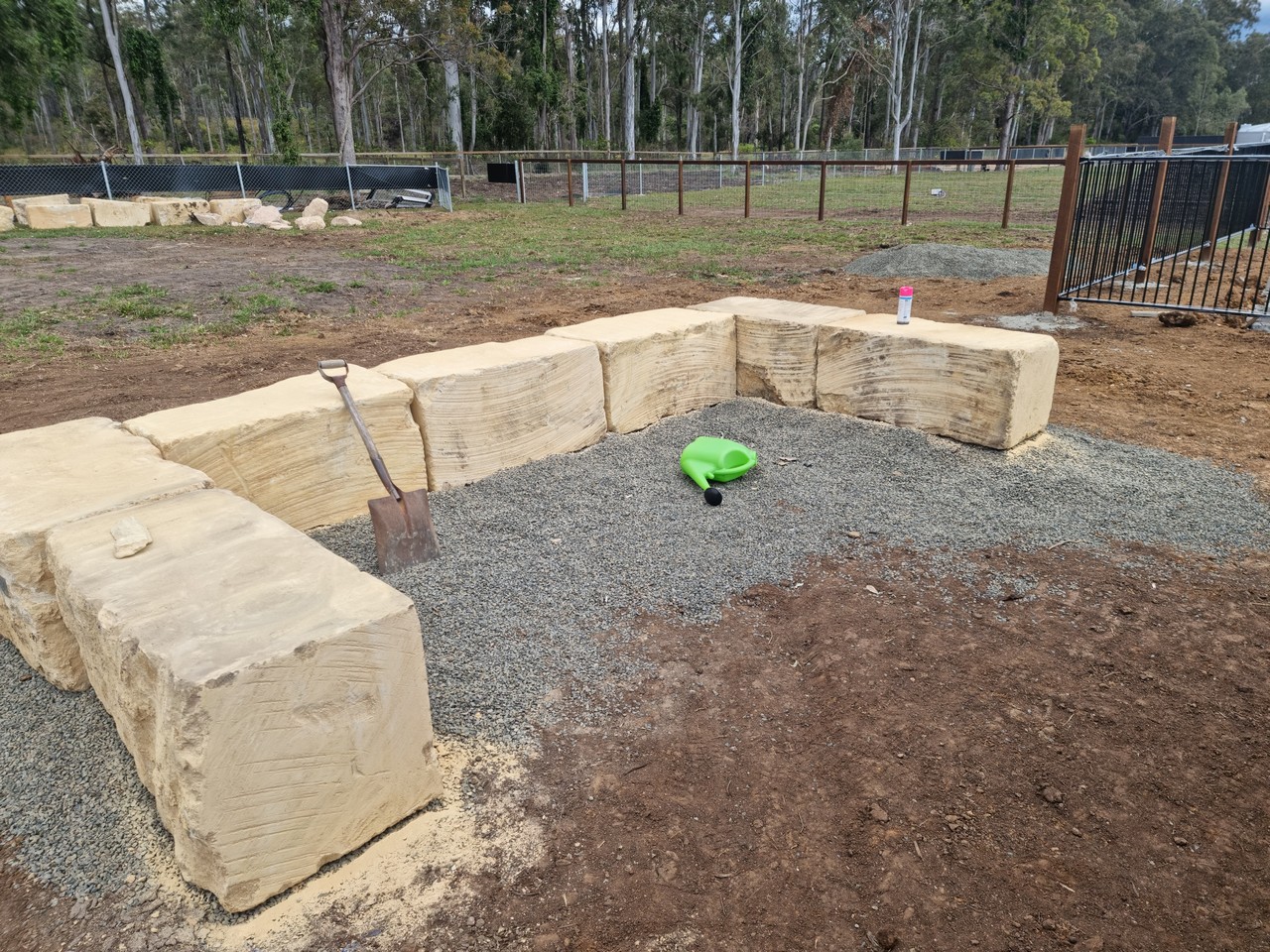 Sandstone block seating area with gravel base