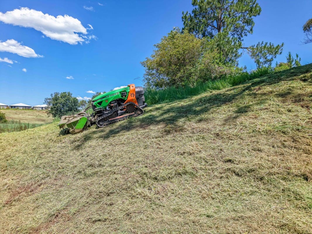 Remote-controlled forestry mulching machine on steep terrain