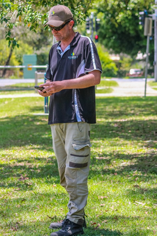Element Queensland supervisor reviewing a grounds maintenance contract on site